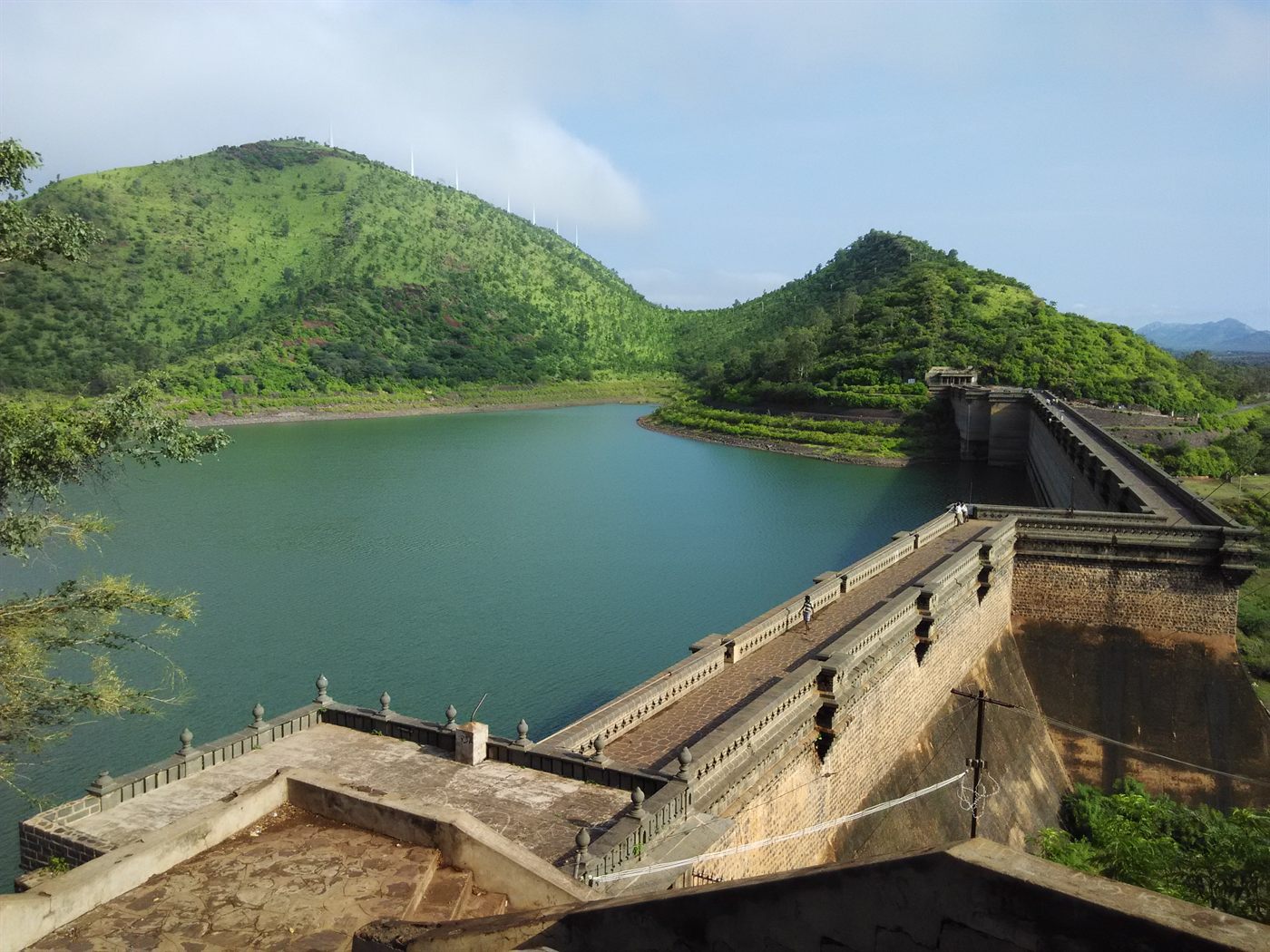Aerial view of a large dam and reservoir